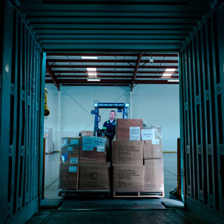 Hub Group team loading LTL freight management solutions onto truck