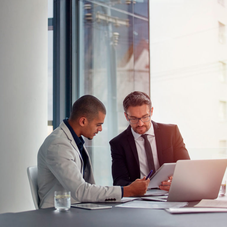 Two team members offering solutions for private equity logistics industry