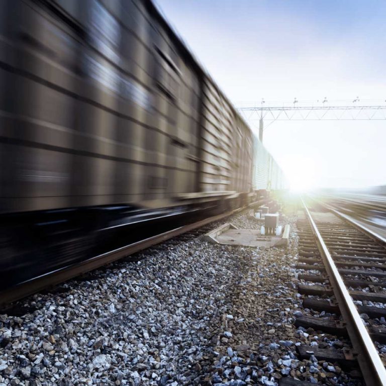 Intermodal railcar freight train in motion