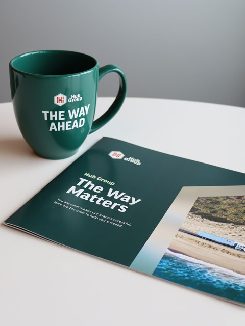 Hub Group mug and pamphlet